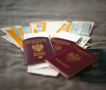 Close-up of Polish passports and travel tickets symbolizing travel and adventure.